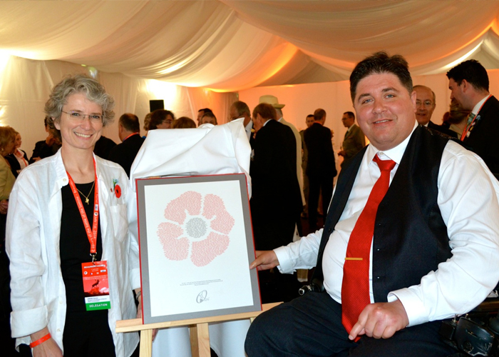 Dr. Karen Ewing presents a plaque to Kent Hehr, minister of Veterans Affairs, at a reception prior to the commemoration ceremonies on July 1, 2016 at the Beaumont-Hamel Newfoundland Memorial in France. 
PHOTO: Submitted