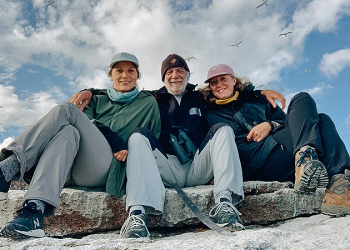 Dr. Bill Montevecchi (centre) with his daughters, Gioia Montevecchi (right) and Marina Montevecchi, working with common murres, circled by gannets,
on Funk Island Seabird Ecological Reserve.

PHOTO: SUBMITTED