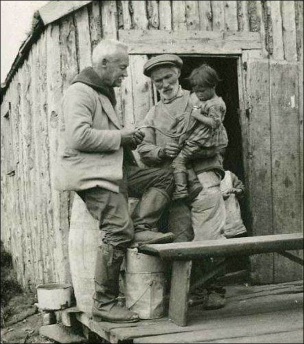 Sir Wilfred Grenfell with the Roberts family of Seal Islands