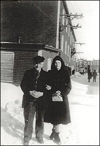 Isaac Russell and Mabel Lodge outside the Fishermens Advocat Building.