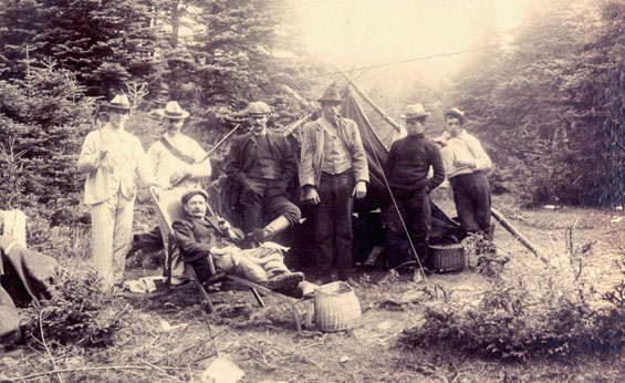 Group of men camping, Placentia
