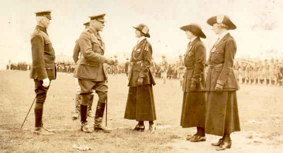 Sir Douglas Haig greeting three women at the inspection of the troops, headquarters of the Great War Veterans Association