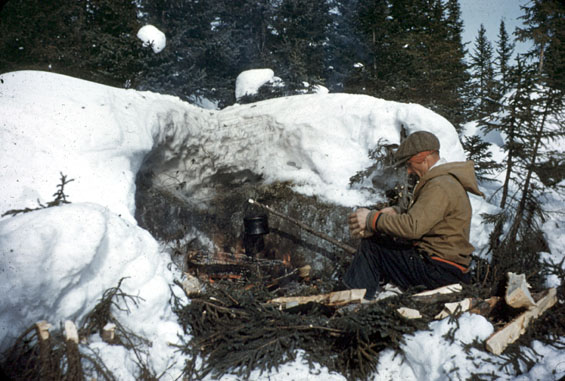 Russell Groves boiling a pot outside in Labrador