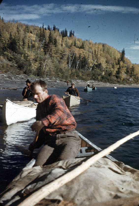 Russell Groves and other men canoeing up the Grand River, Labrador