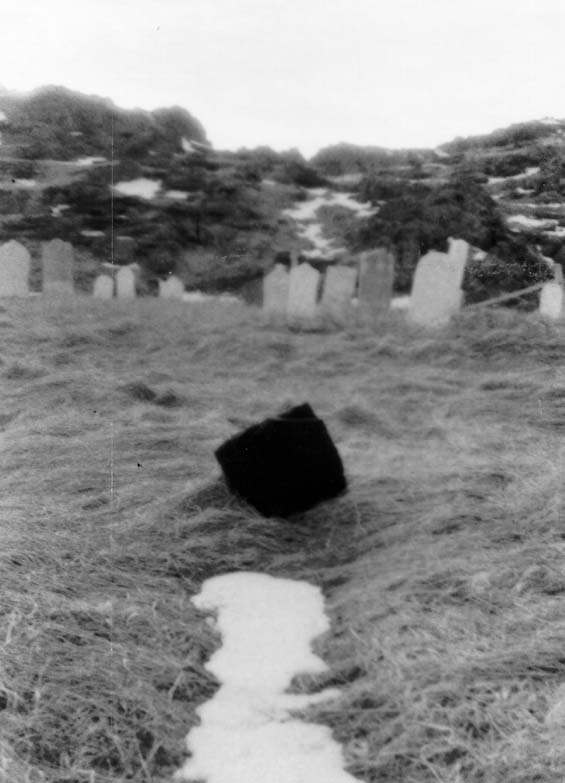 Headstone tipped over at the cemetery in Exploits, Newfoundland
