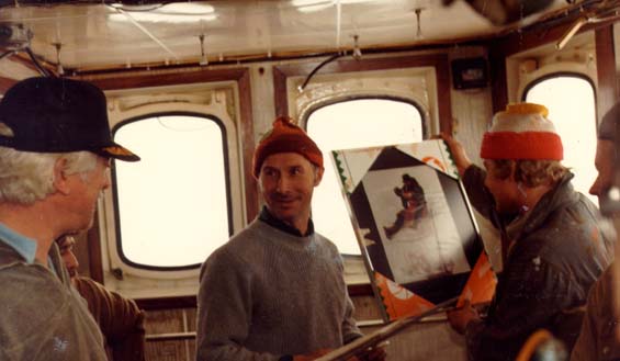 Capt. Morrissey Johnson (left) and sealers in the wheelhouse of the 
