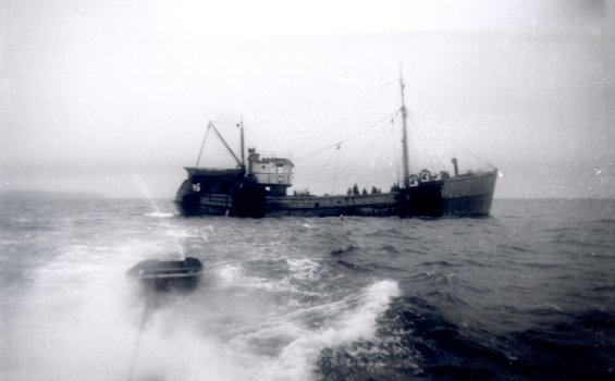 An unidentified fishing boat, possibly the 