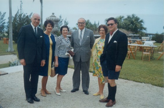 Harold L. Lake's wife, Robin (second from right), with a group of men and women