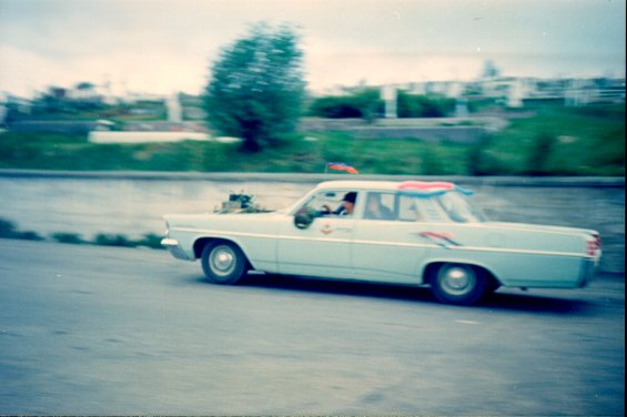 A car taking part in a motorcade on The Boulevard, St. John's, Newfoundland