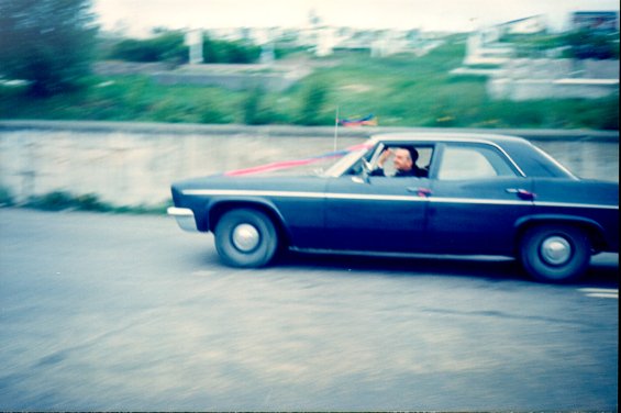 A car taking part in a motorcade on The Boulevard, St. John's, Newfoundland