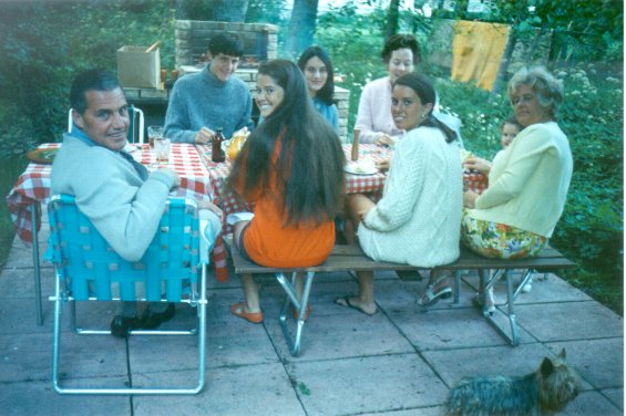 Members of the Lake family having a barbeque