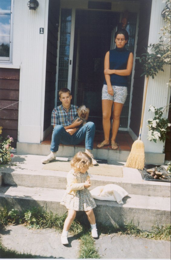 Harold L. Lake's daughter with a boy sitting on the front steps of the Lake family home known as 