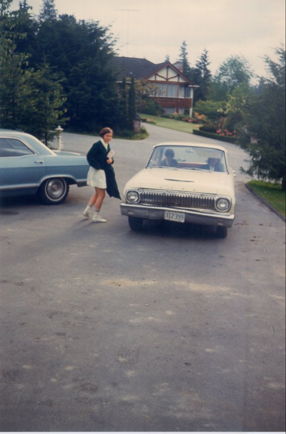 Unidentified girl walking to a car