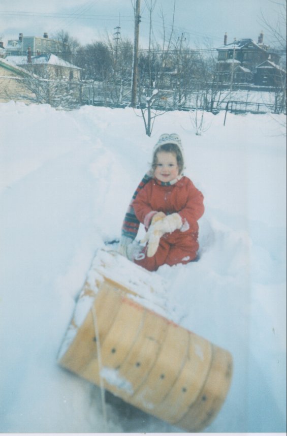 Harold L. Lake's daughter playing in the snow
