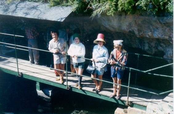 Harold L. Lake's wife, Robin (left), with her two daughters and another girl (right) on a bridge in St. George, Bermuda