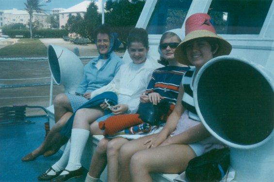 Harold L. Lake's wife, Robin (left), and two daughters with another girl on a boat in St. George, Bermuda