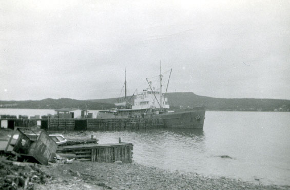 Unidentified ship docked at a wharf