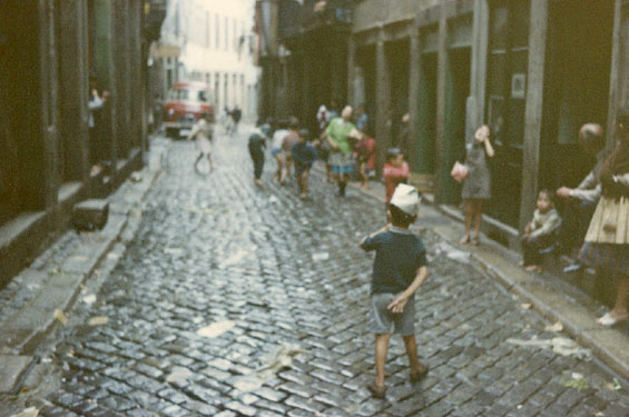 People on a cobblestone street
