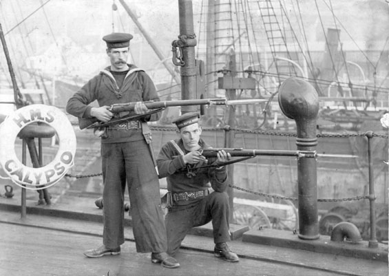 (L-R): Albert Gregory of Harbour Buffett, Placentia Bay and an unidentified naval trainee  on H.M.S. 