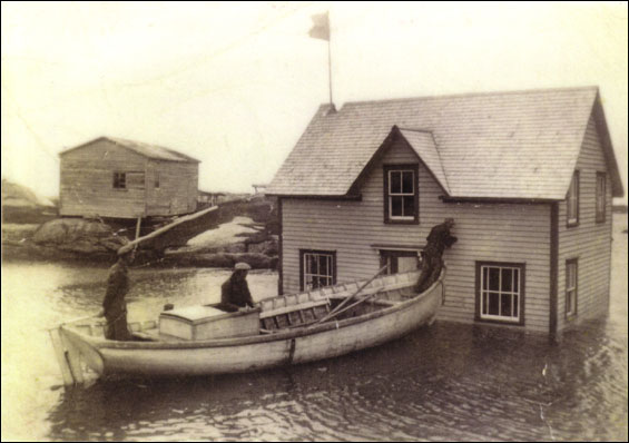 Cape Island, house of Walt Andrews, floating house across Inner Tickle of Newtown after being purchased in Newtown,  1952
