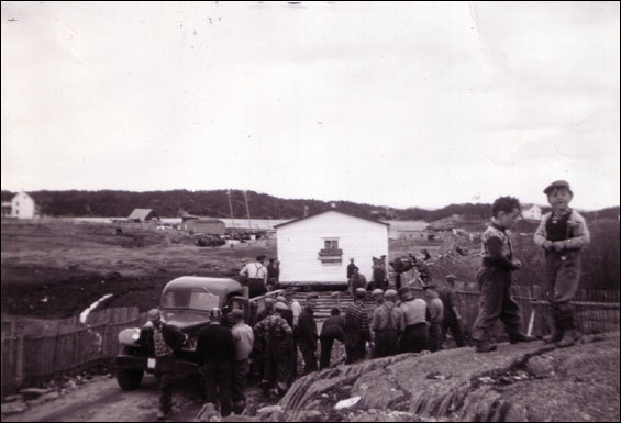 House of John Morgan being pulled ashore  in Burnside