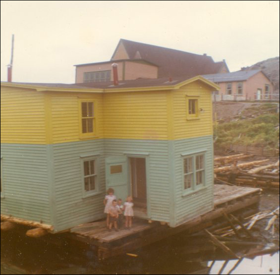 Jack Wadman house on a barge ready to move from Bar Haven to Southern Harbour, Placentia Bay