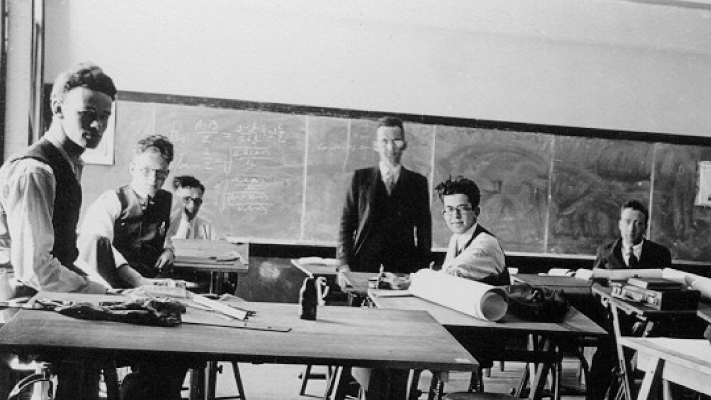 Black and white photo of engineering students in class with Professor C.A.D. McIntosh.
