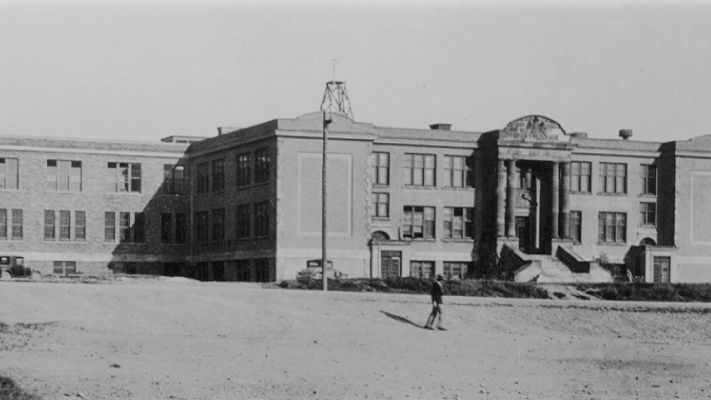 A black and white photo of the Parade Street campus building from 1932