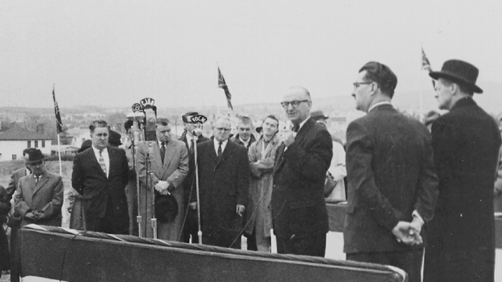 A black and white photo of Premier Joseph Smallwood turns the first sod to begin construction of the new university campus on Elizabeth Avenue in St. John’s.