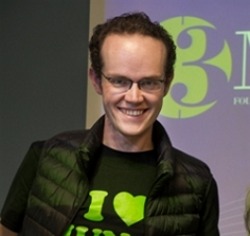 Headshot of researcher at 3MT competition