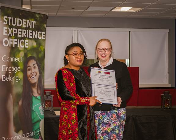 Rita Ujunwa Onah receiving the Faculty Volunteer Award 2023