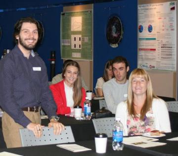 Craig Ayre (left) enjoying the Symposium along with members of the Christian Laboratory