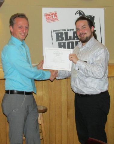 Runner-up Mark Nosworthy receives his certificate from Dr. Mark Berry