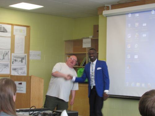 Dr. Rob Brown presents award to Olatunji (Anthony) Akerele 