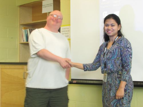 Dr. Rob Brown presents award to Shreyasi Sarkar  