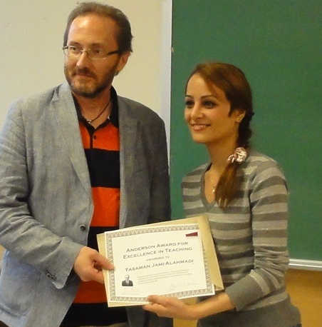 Ph.D. candidate Yasaman Jami-Alahmadi receiving the award for best teaching assistant from Anderson Award Lecturer Steve Westcott.