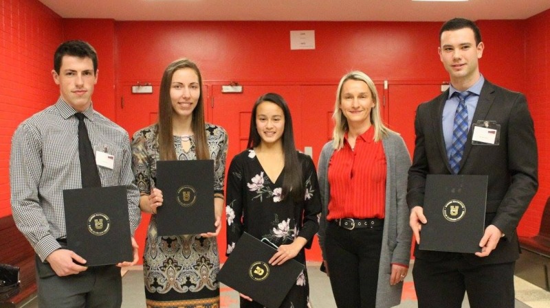 Joey Pittman (far right) with other members of his track and field team

who were also honoured as Academic All Canadian athletes.



The people from left to right are:



Gerard Power (HKR), Erica Hayward (Med.), Nicole Chan (Eng.), Dr.Jennifer Stender (