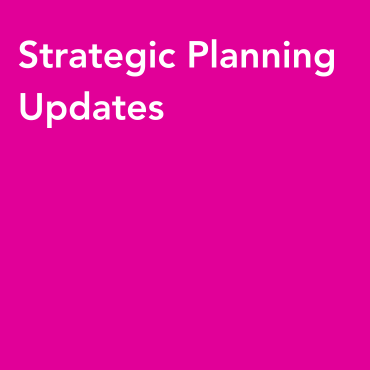 A pink square, with white text reading 'Strategic Planning Updates' at the top left of the image.