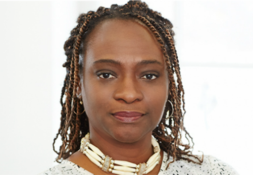 A headshot-style photograph of Dr. Beverly-Jean Daniel