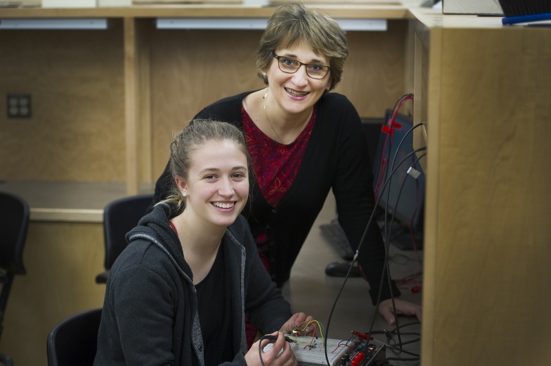 Dr. Octavia Dobre with engineering student.