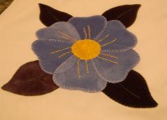 Bussey, Winnie. Close-up of an applique velour flower quilt made by Winnie Bussey, St. Lunaire-Griquet