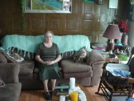 Dredge, Blanche. Blanche Dredge poses in her living room, Black Duck Cove