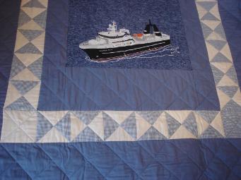 Patey, Gwen. An applique boat quilt made by Gwen Patey for her husband, Quirpon