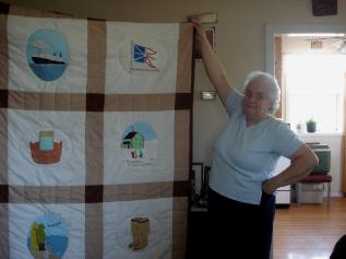 Reid, Marie and Oliver. A painted Newfoundland quilt made by marie Reid, Roddickton