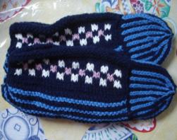 Young, Joyce. A pair of blue stripped knit slippers made by Joyce Young, Quirpon