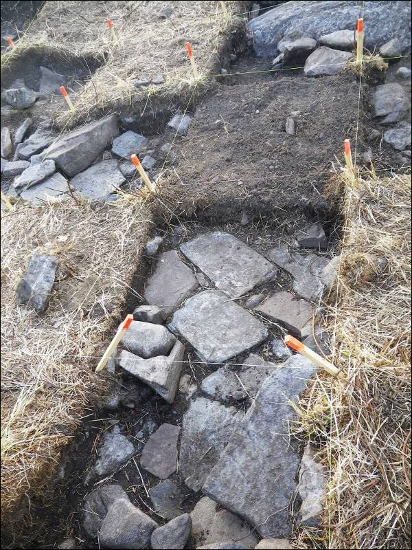 Stone floor of Pigeon Cove excavation site