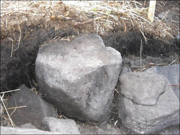 Lamp stand with oil residue from Pigeon Cove excavation site