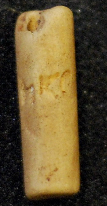 Kaolin pipe stem with initials HKC(?)