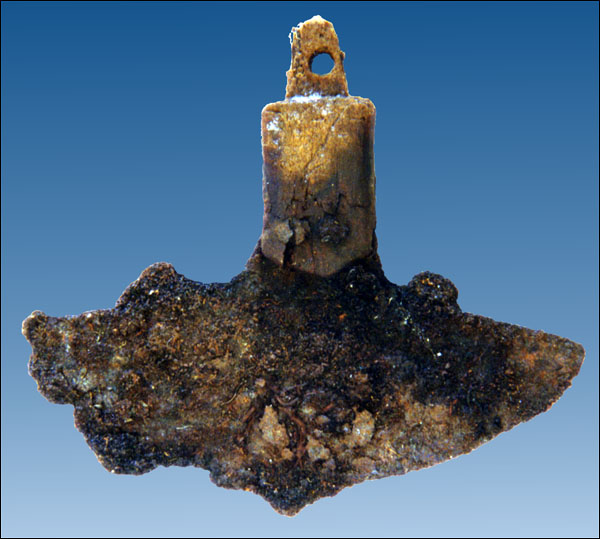 An iron-bladed ulu with a whale bone handle