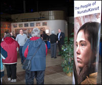 Poster in Theatre Lobby as Crowd Forms